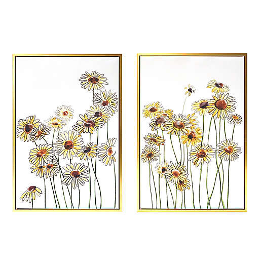 Two floral canvas art prints framed in gold.