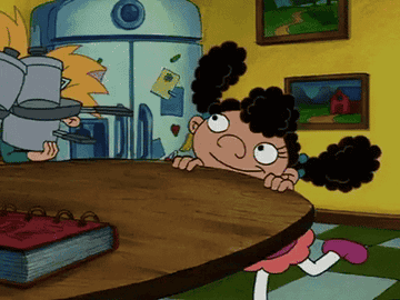 Arnold from &quot;Hey Arnold&quot; dropping pots and pans on a table.