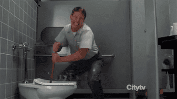 Kenneth from &quot;30 Rock&quot; cleaning a toilet