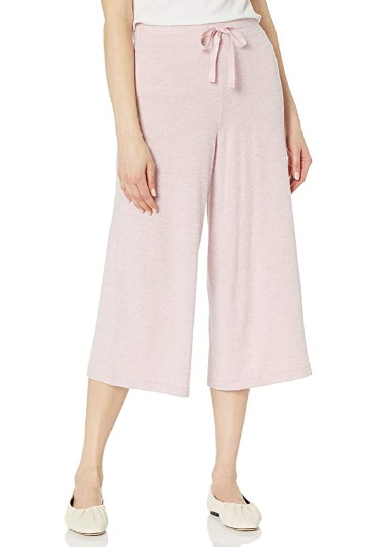 A pair of women&#x27;s knit culottes in speckled dusty pink/white marl