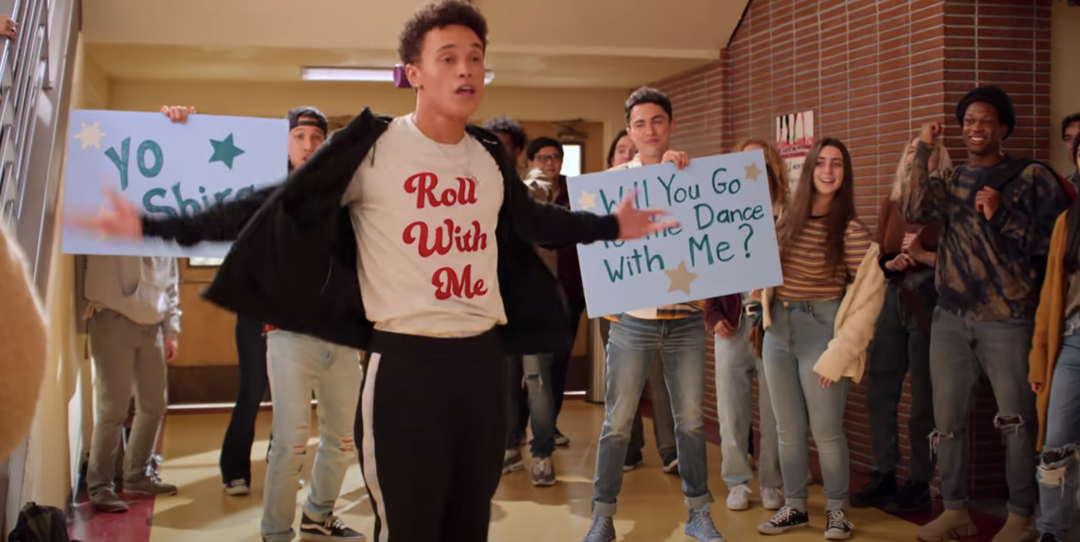 A promposal in the middle of the hallway