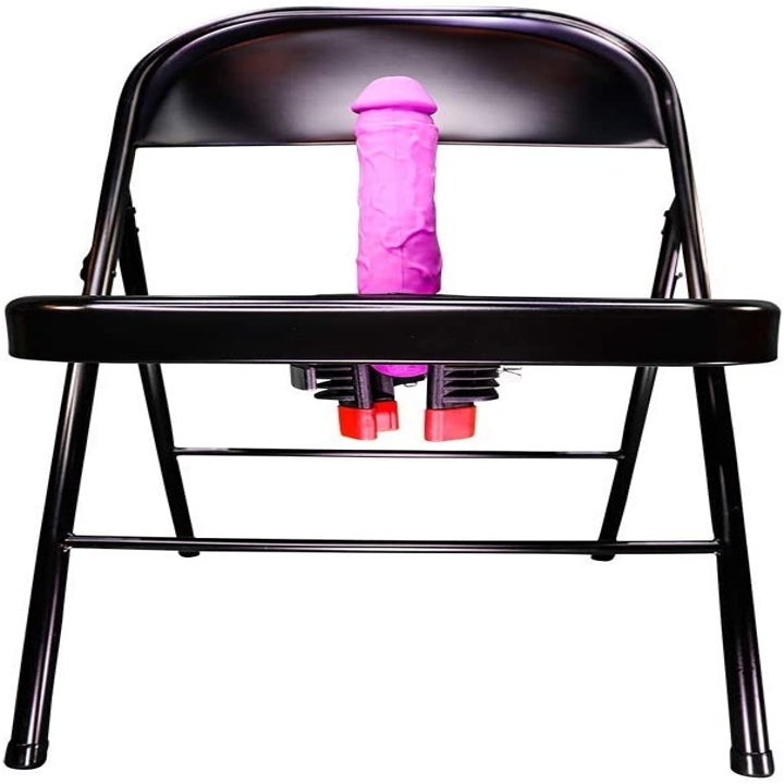 Folding chair with pink realistic dildo in center hole