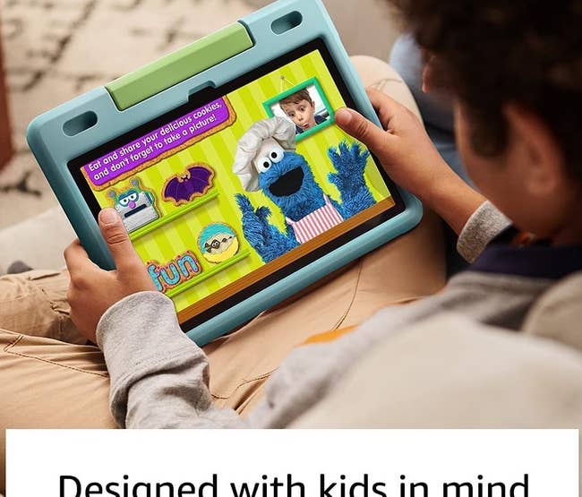 A child watching Sesame Street on the tablet