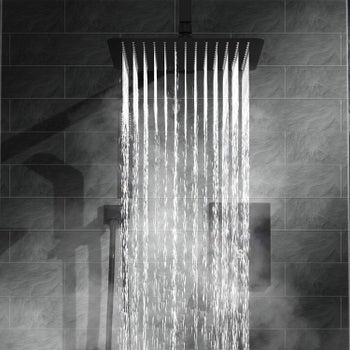the shower head with water pouring out of it