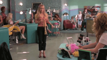 Elle doing the bend and snap in the hair salon