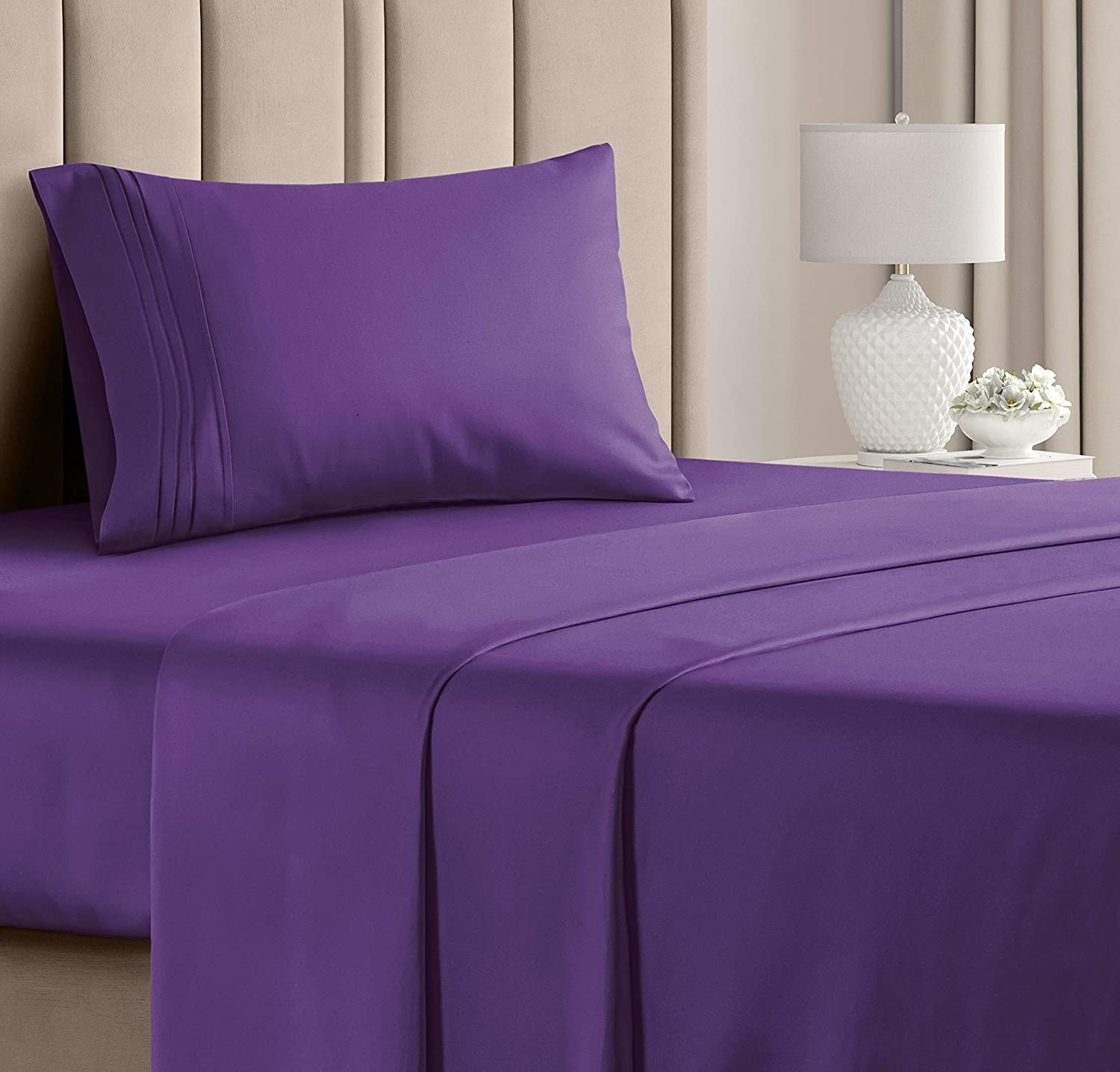 purple sheets and a pillowcase
