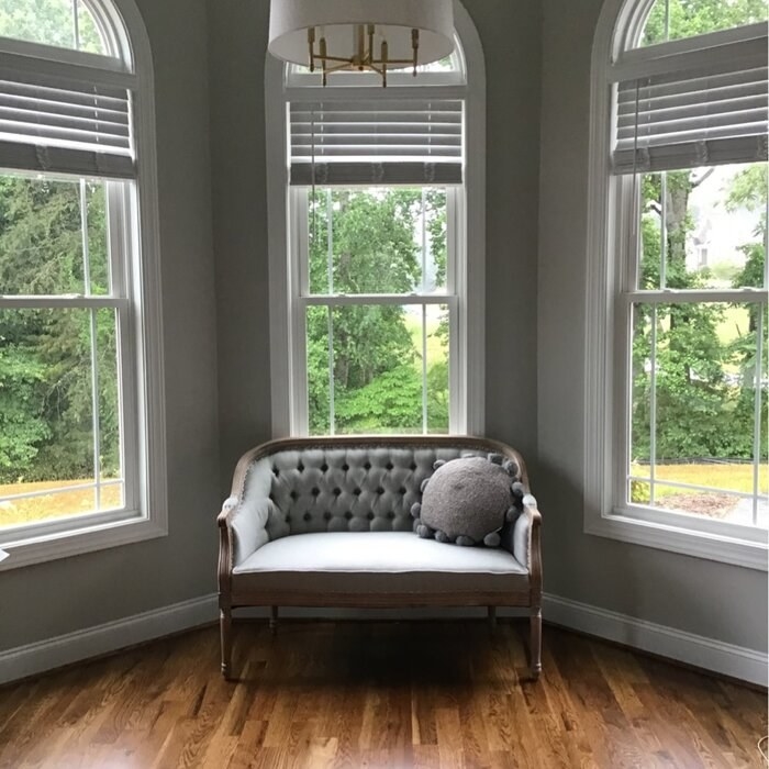 The loveseat in a corner of a reviewer's home