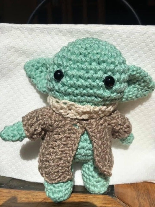 Small crocheted Yoda figurine