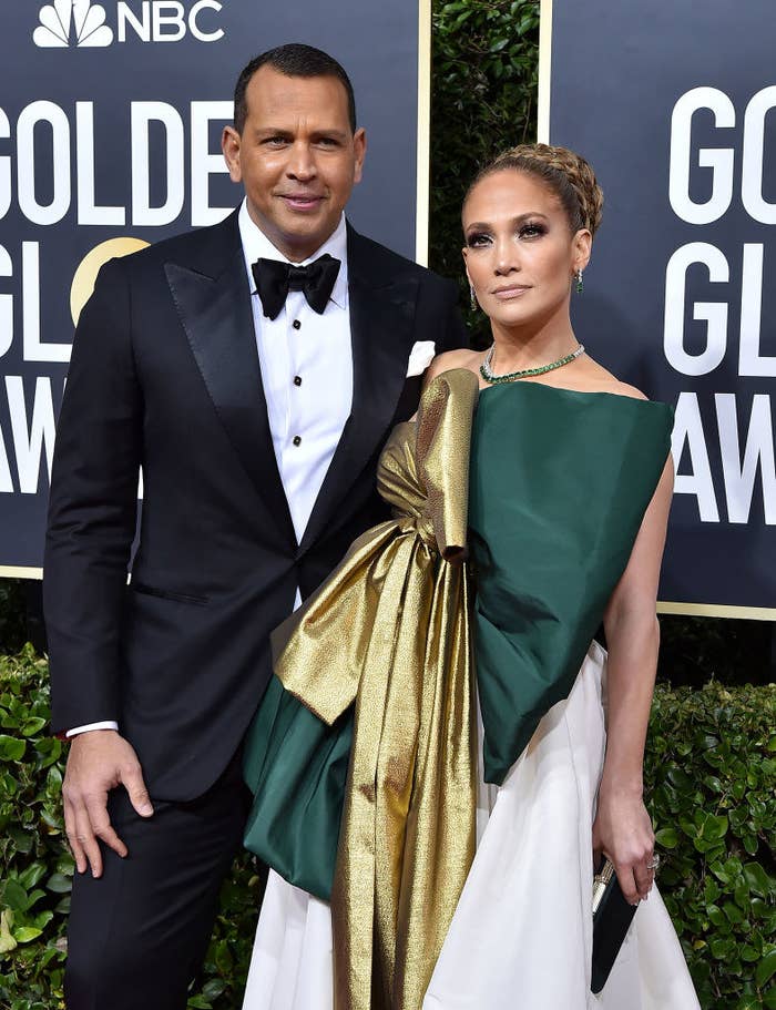 Alex Rodriguez and Jennifer Lopez pose on the Golden Globes red carpet.