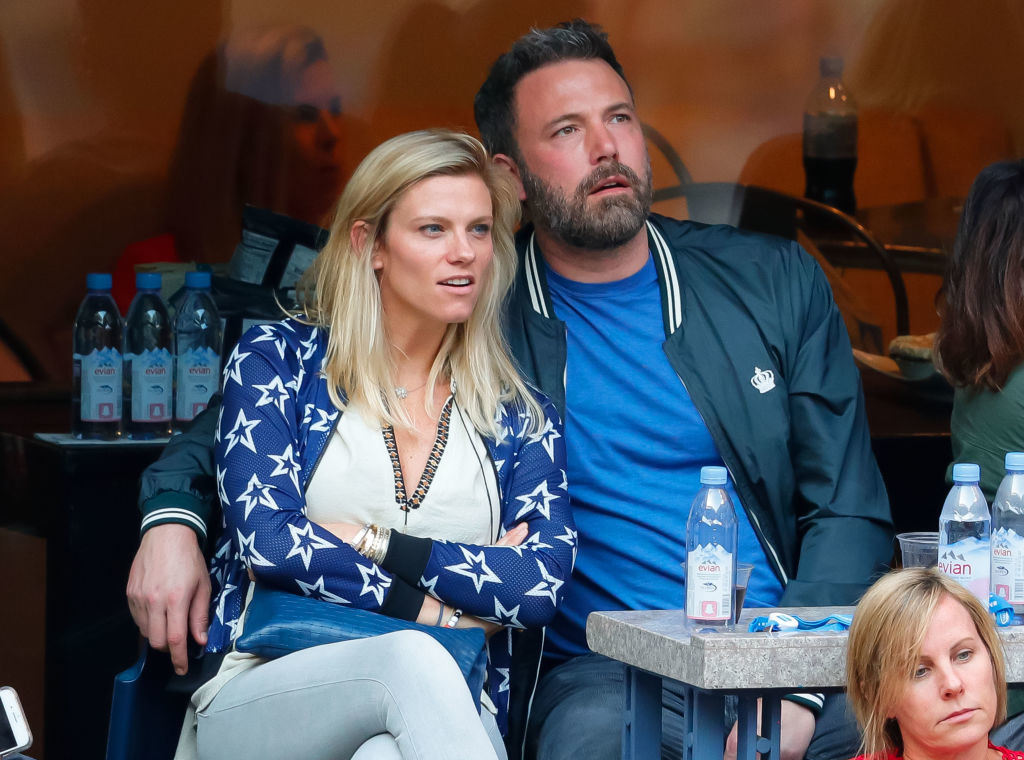 Lindsay Shookus and Ben Affleck cuddle while attending the US Open.