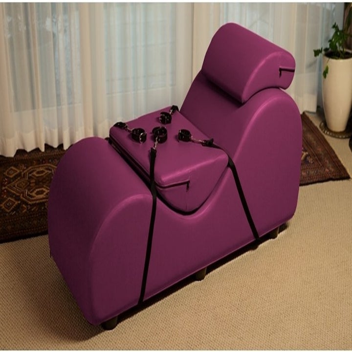 Purple faux leather bench with black restraints