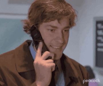 a gif of Jim from &quot;The Office&quot; talking on the phone and saying &quot;please hurry&quot;
