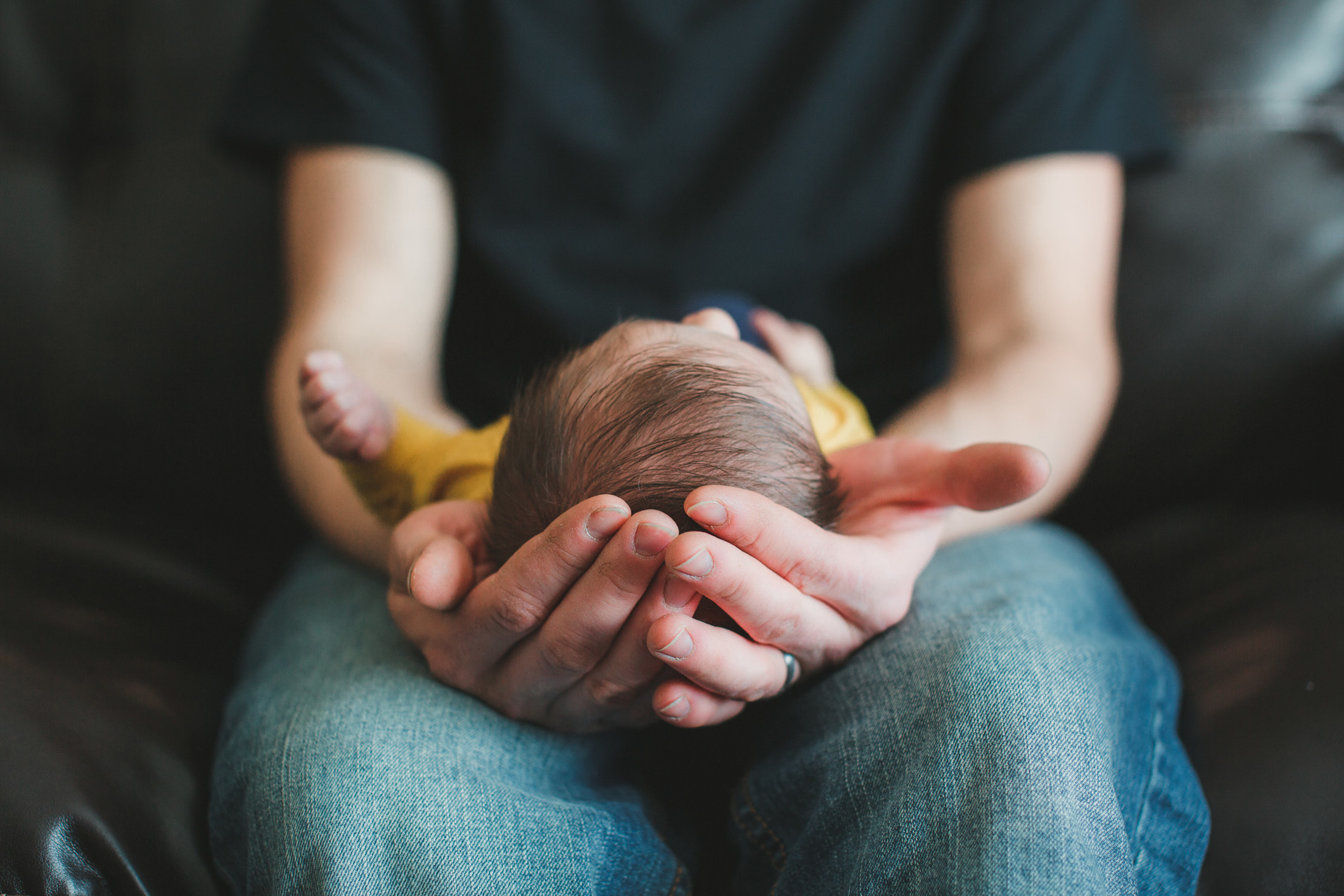 A father holding his newborn