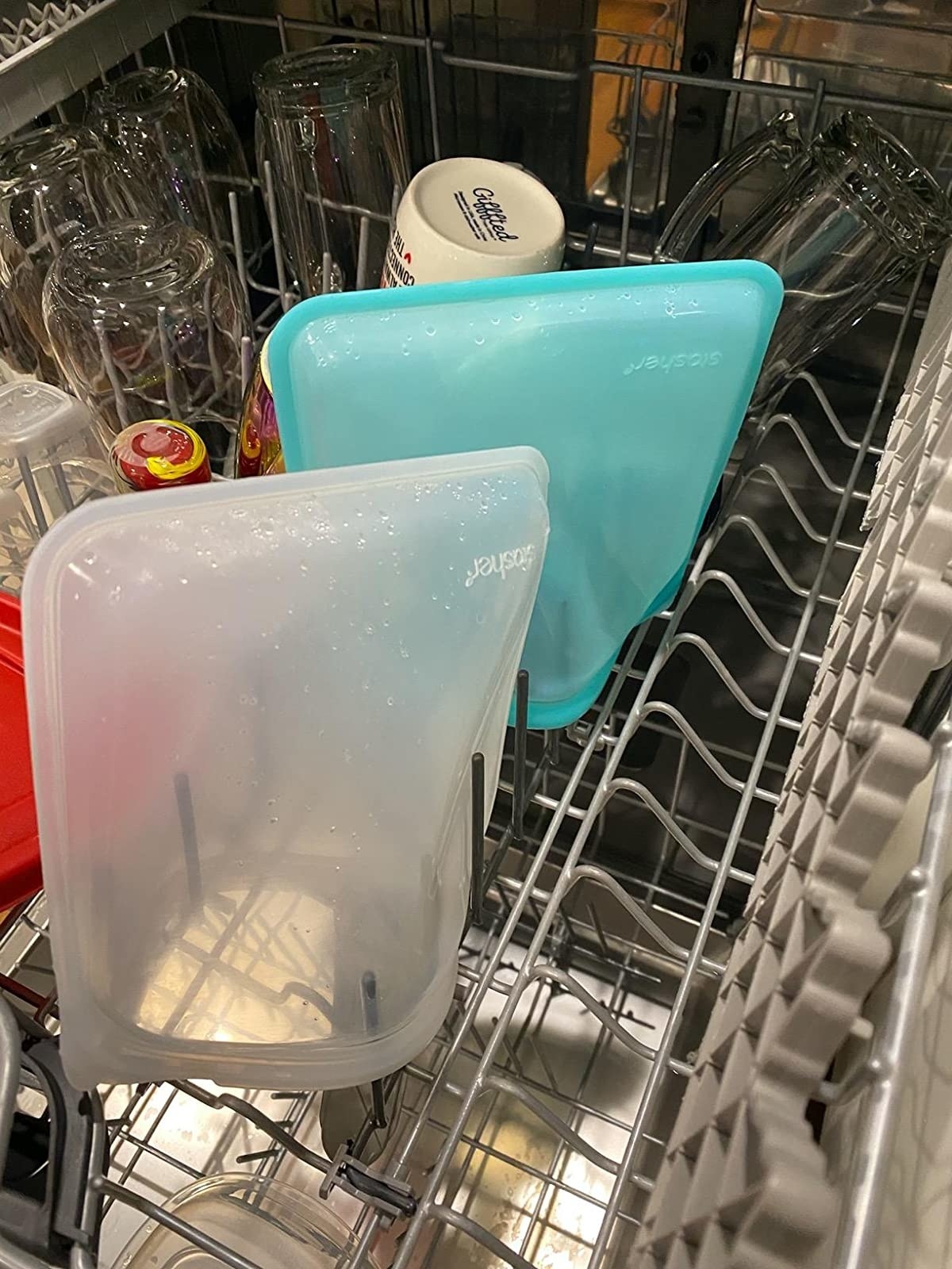 a reviewer&#x27;s stasher bags in the dishwasher