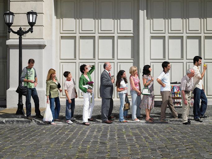 Line of people closely standing next to each other