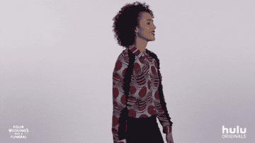 Nathalie Emmanuel smiles in this gif for Hulu