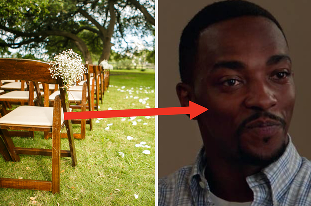 Wooden chairs are lined up for a wedding ceremony with baby breath flowers tied to them and Sam Wilson smiles softly.