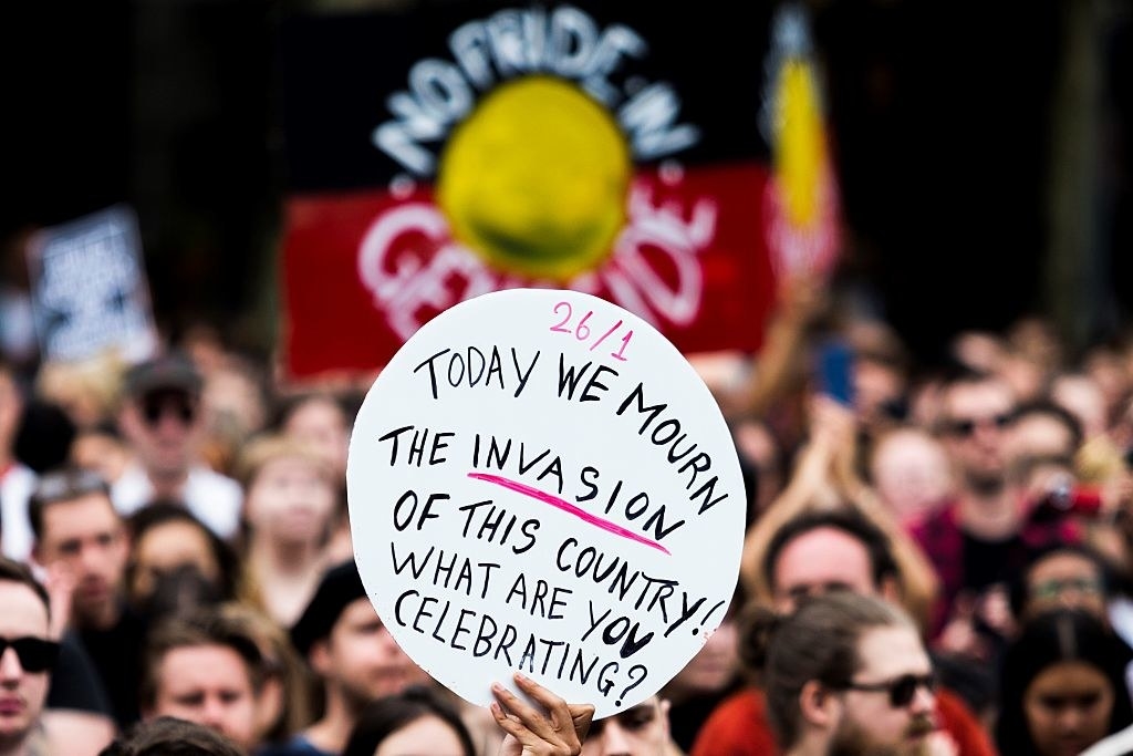 A sign from a January 26 protest in Australia that reads: &quot;Today we mourn the invasion of this country! What are you celebrating?&quot;