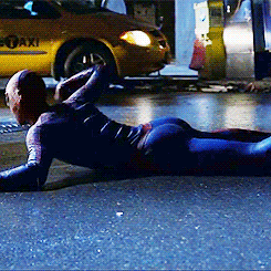GIF of Andrew Garfield as Spider-Man lying on the street