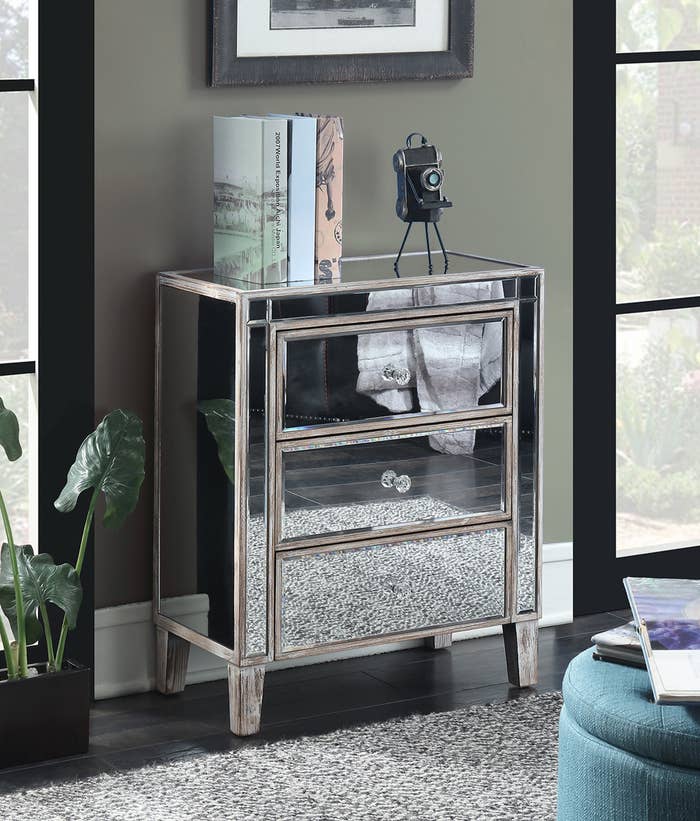 mirrored, three-drawer end table