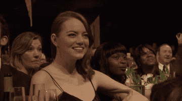 Emma Stone smiles while attending the SAG Awards