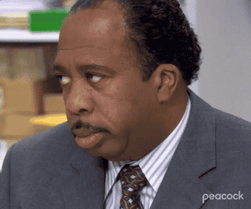 Stanley from The Office rolling his eyes