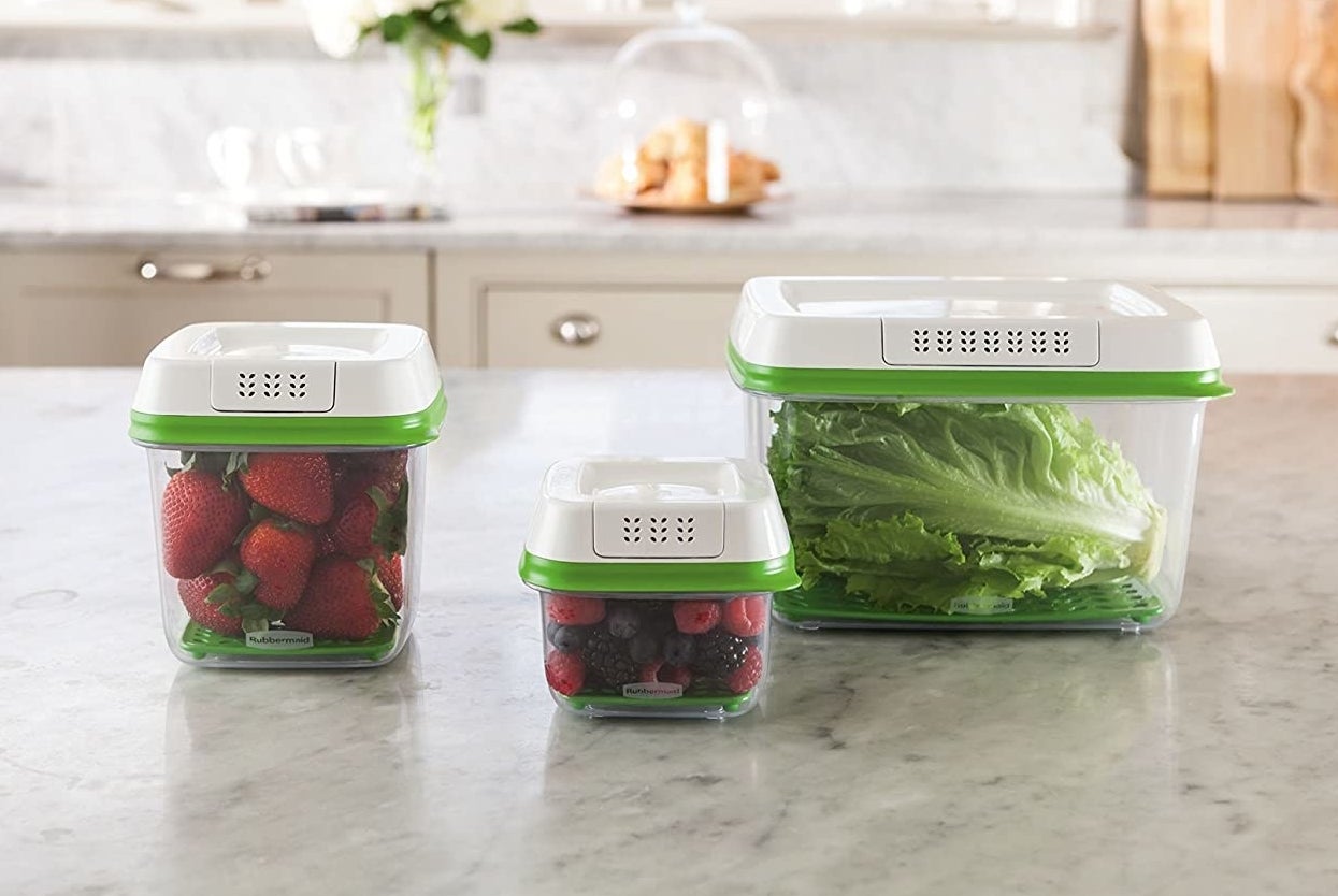 A trio of produce-saving boxes filled with fresh fruit and veggies