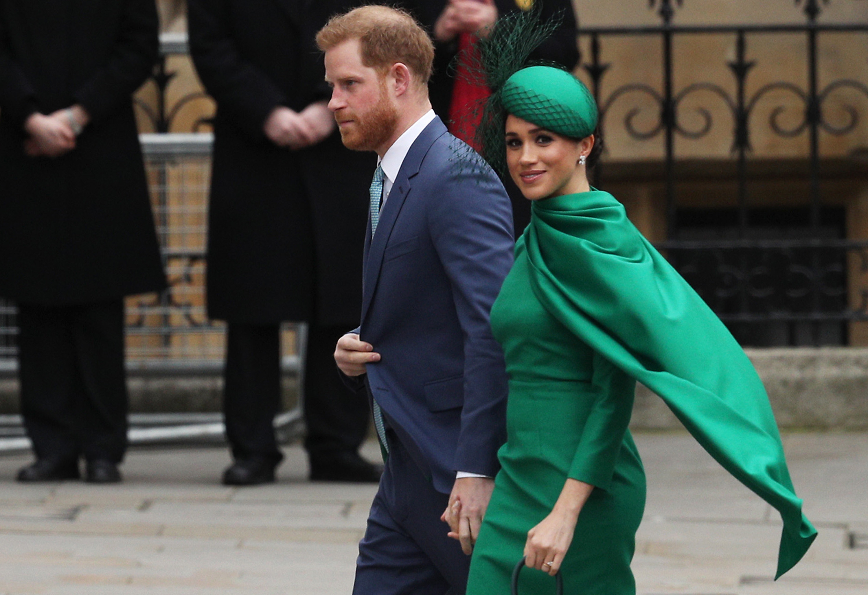 Prince Harry and Meghan Markle are pictured walking while holding hands