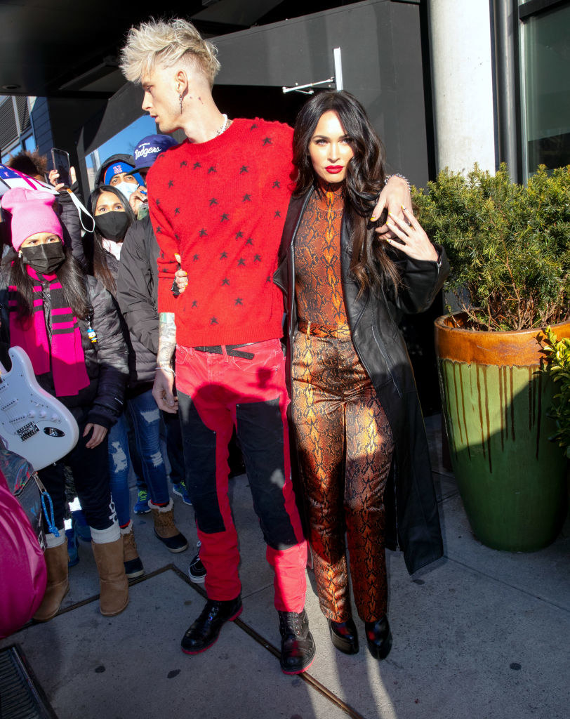 His ladybug sweatshirt and her snakeskin pantsuit