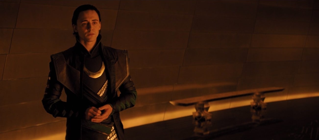 Loki stands near a bench