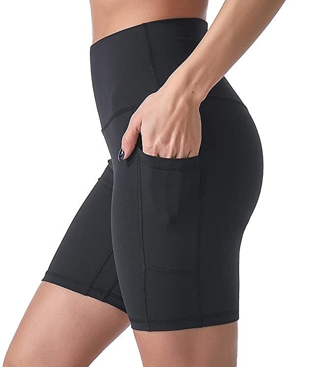 a person wearing bike shorts with pockets
