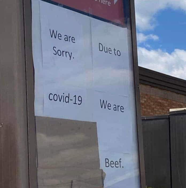 sign reading we are sorry due to covid-19 we are beef