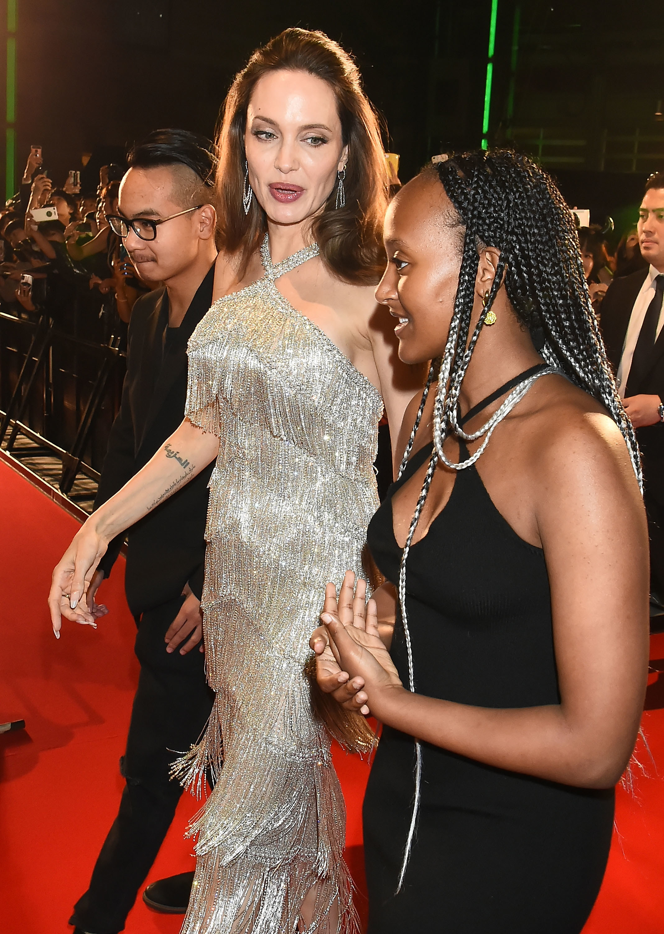 Zahara Marley Jolie-Pitt, Angelina Jolie, and Maddox Jolie-Pitt attend the Japan premiere of 'Maleficent: Mistress of Evil' at Roppongi Hills arena on October 3, 2019, in Tokyo, Japan