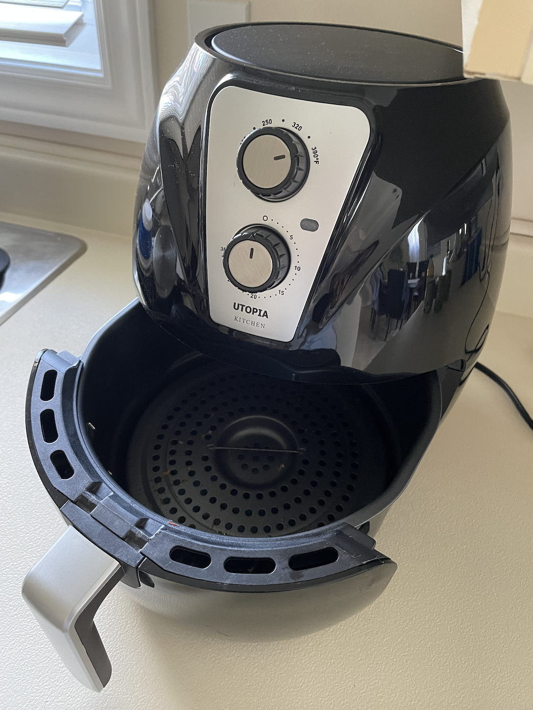 the air fryer with the tray out