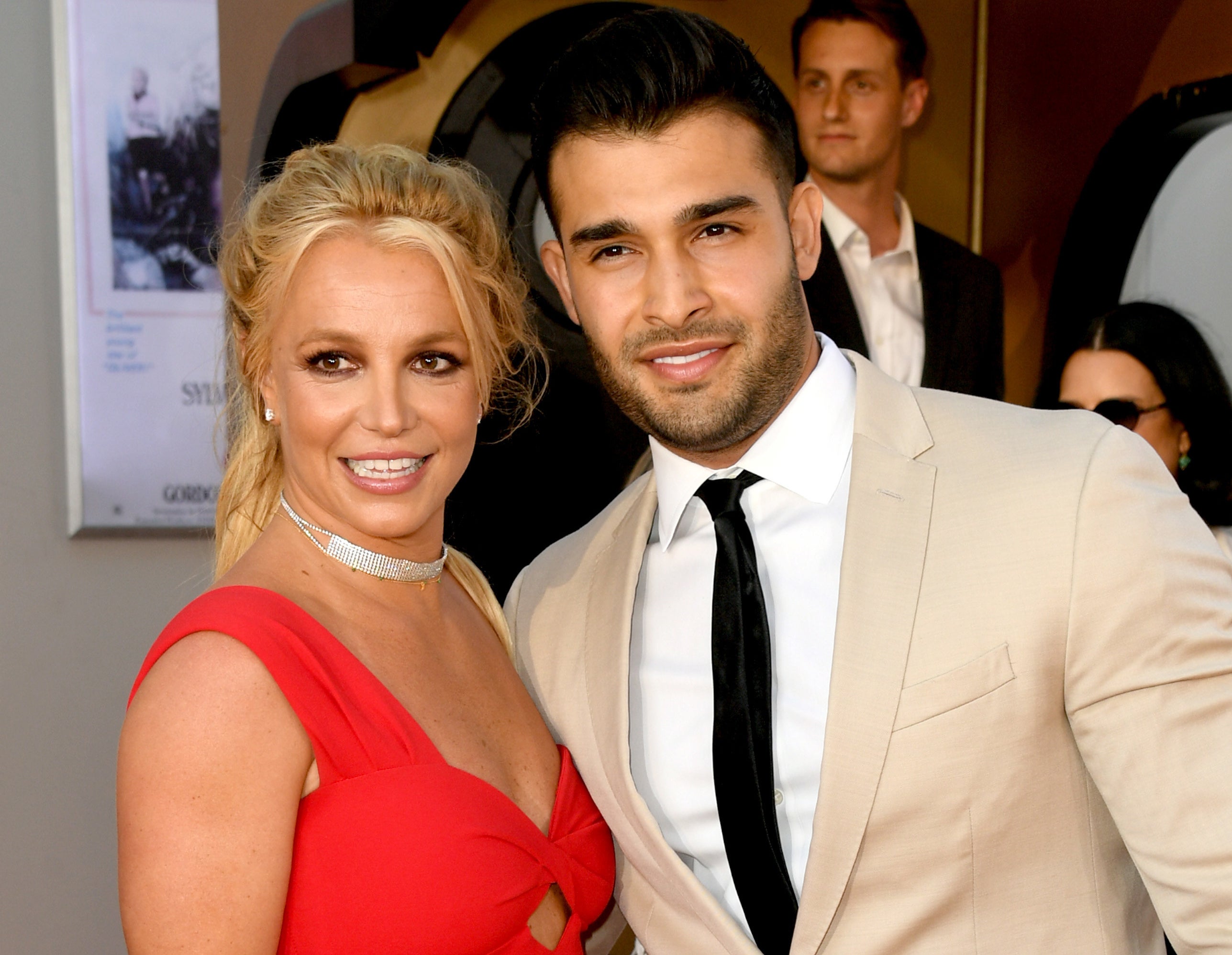 Britney and Sam pose together at an event