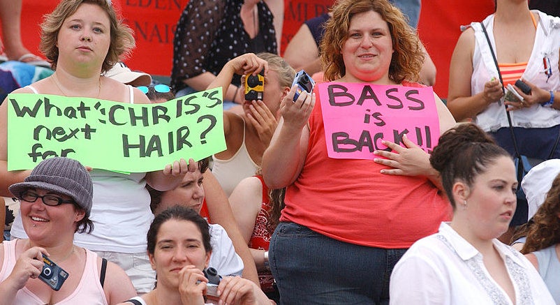 a nsync fan with a whats next for chris&#x27; hair sign