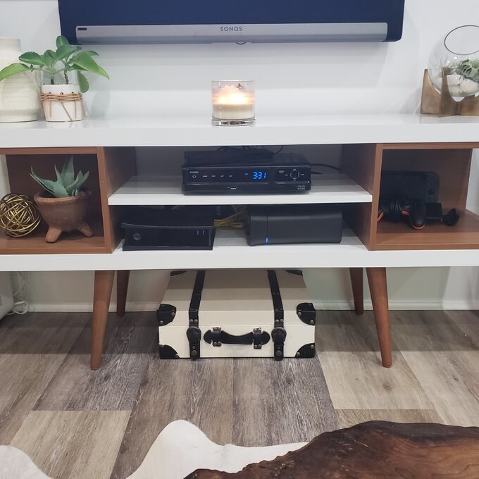 reviewer's photo of the tv stand