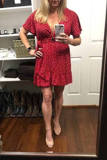 Reviewer wearing red polka dot dress