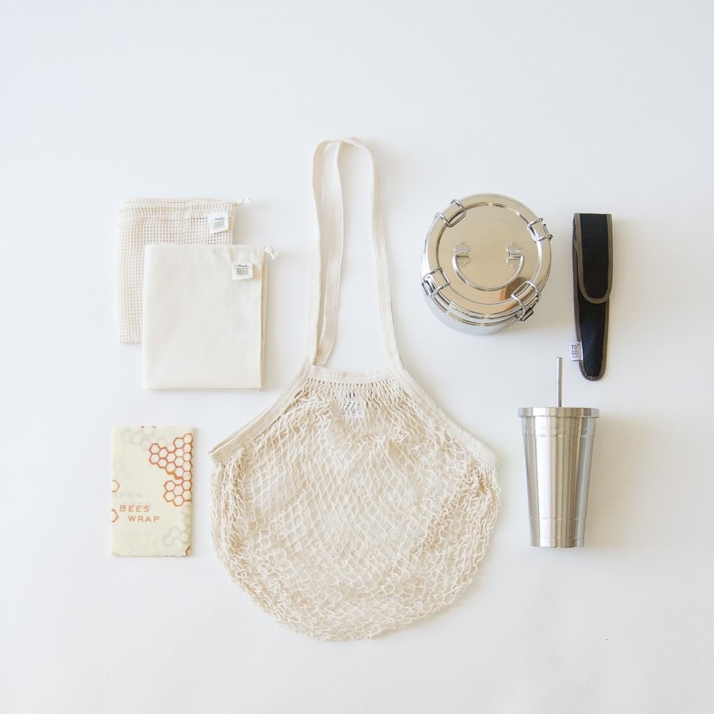 the complete zero waste starter kit spread out on a white surface