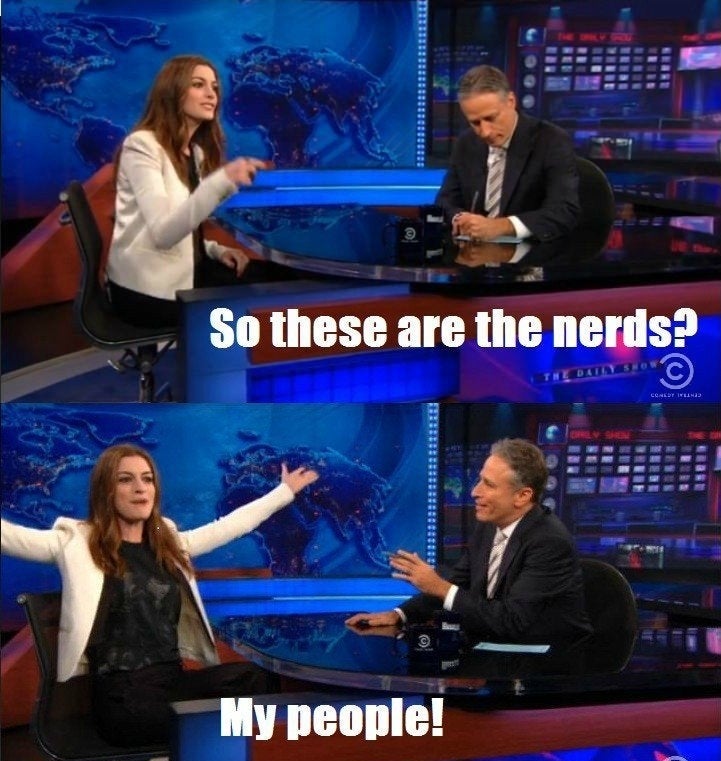 Anne Hathaway says "so these are the nerds? my people!" then throws her hands up