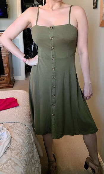 Reviewer's wearing dress in army green