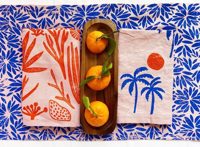 Pink napkins with stamped tropical patterns