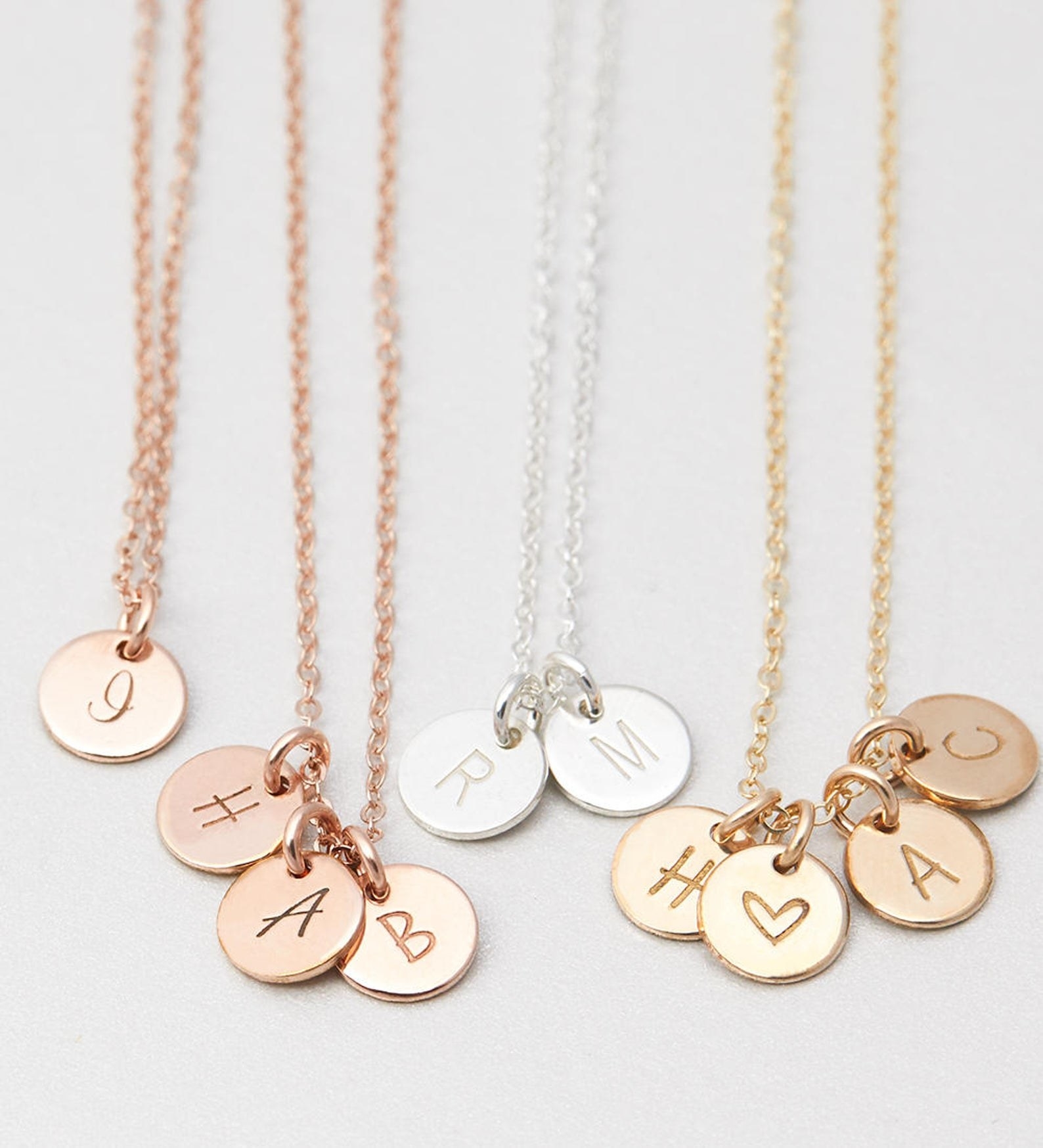 necklaces in gold, rose gold, and silver