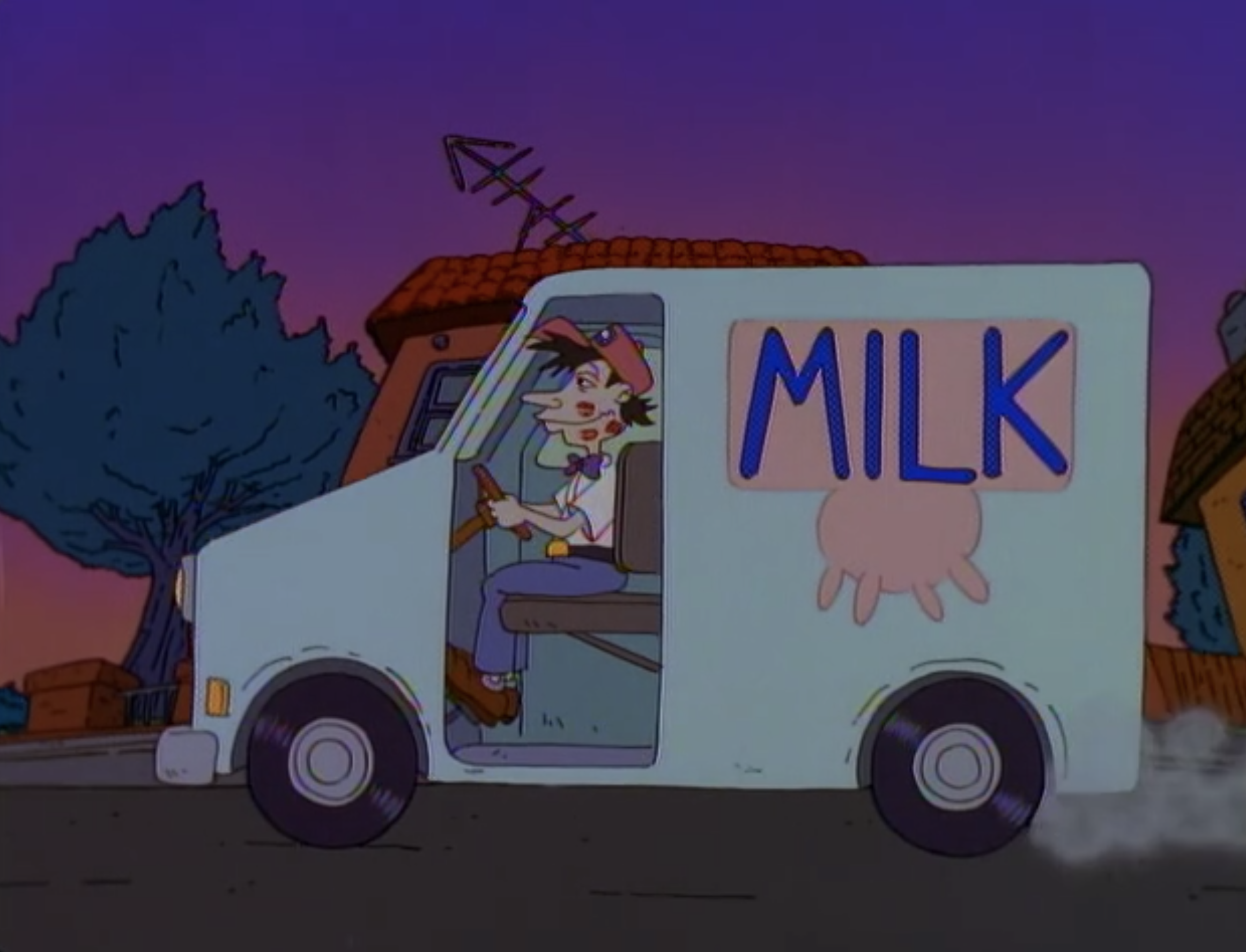 A milkman driving away with his face covered in lipstick smooches