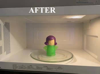 an after photo of a clean microwave with the angry mama inside