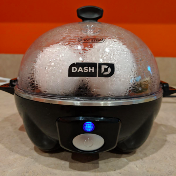 A customer review photo of the egg cooker on their counter making the eggs