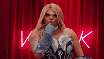 Kandy Muse blowing a kiss with sass