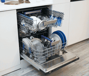 A fully loaded clean dishwasher with the shelves coming in and out by themselves