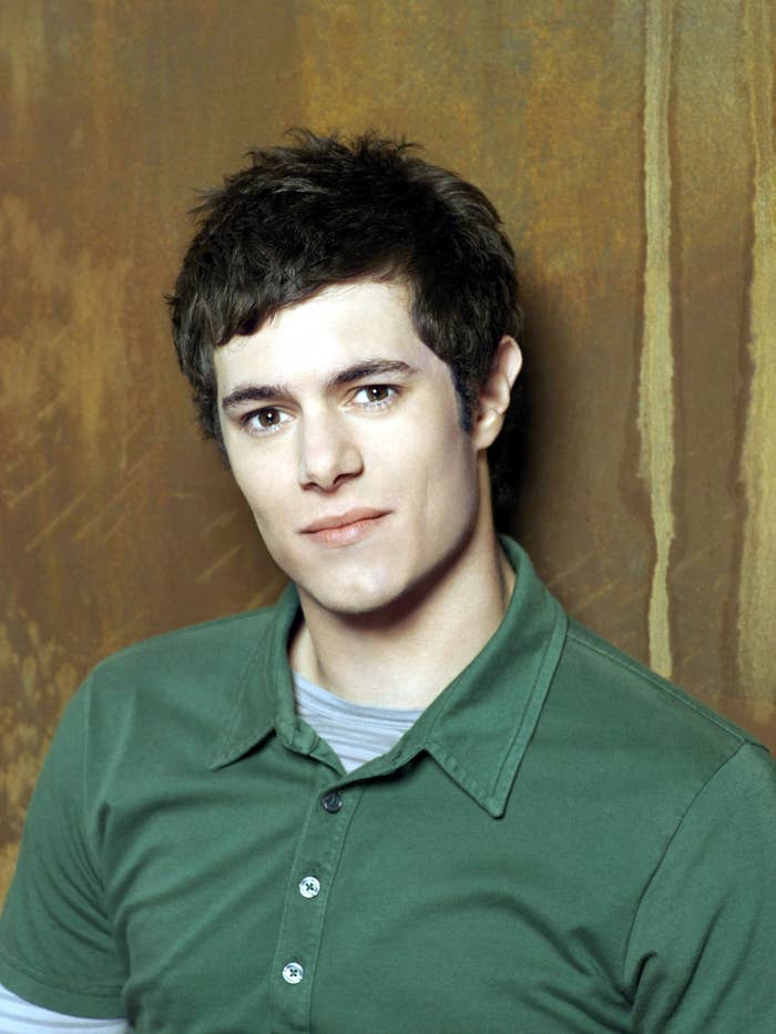 A headshot of Adam Brody for The O.C.