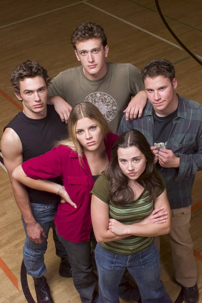 Philipps, James Franco, Linda Cardellini, Seth Rogen, and Jason Segel pose for a promotional photo on a hardwood basketball court